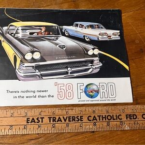 Vintage 1958 Ford Brochure Cover with Yellow and Black Car Illustration